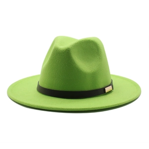 Detail of wool felt jazz hat in bright green featuring black leather band and metal buckle