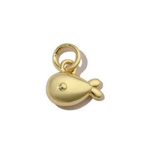 Detailed view of a golden polished small whale fish pendant for DIY jewelry making