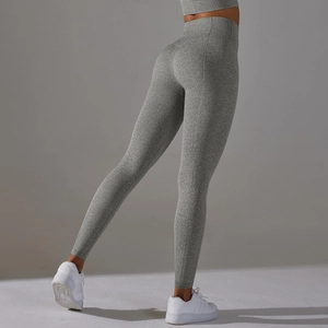 Detail of high-waisted seamless yoga leggings in dark grey marl with ribbed waistband
