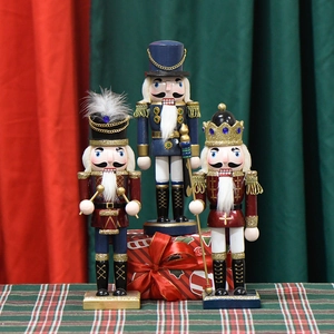 Three 25cm pearlescent pink wooden nutcracker figurines for Christmas home decor