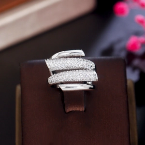 Elegant multi-layer floral pearl crown ring with zircon insets on a premium velvet stand