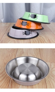 Detail of stacked anti-slip stainless steel slow feeder dog bowls with cat patterns