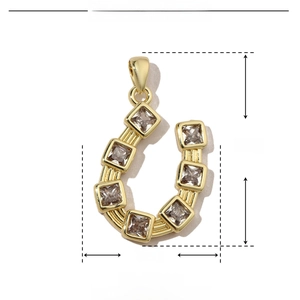 Detailed dimensions of gold horseshoe pendant with zircon, 27mm height and 15mm width