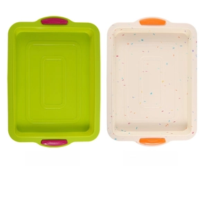 Detail of square silicone brownie cake pans with heat-resistant handles in green and speckled
