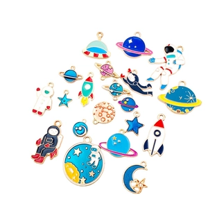 Space-themed enamel pendants featuring astronaut, rocket and moon for jewelry making