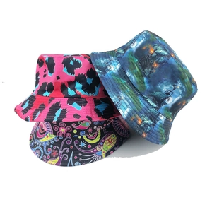 Three versatile reversible bucket hats featuring leopard, nautical, and floral prints