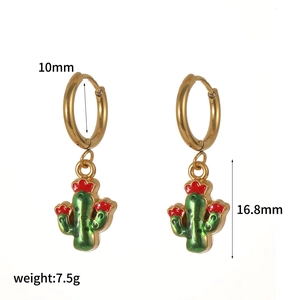 Detail of gold hoops with green cactus pendants and size markings 10mm and 16.8mm