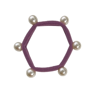 Elastic purple hair tie featuring six white imitation pearl accents on high-stretch fiber