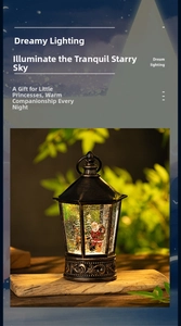 Vintage bronze Christmas lantern with Santa scene and glowing glitter snowflakes inside