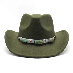 Detail of army green wool felt cowboy hat with decorative ethnic stone and bead band