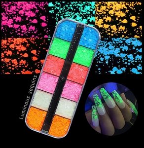 Detailed view of 12-grid luminous nail sequins in neon colors with glow-in-dark effect