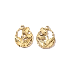 Detailed macro view of two gold hollow tulip flower charms for DIY jewelry making
