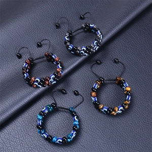 Set of four 8mm tiger eye and evil eye beaded bracelets with woven adjustable ropes