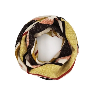 Close-up of striped knit infinity scarf with yellow, white, and brown woven pattern