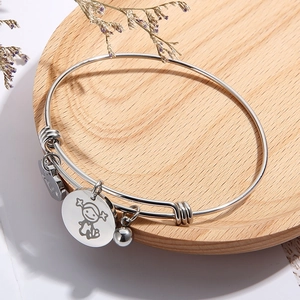 Adjustable stainless steel bangle with cartoon girl charm and polished ball pendant