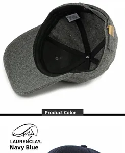 Detail of wool blend baseball cap showing inner lining, brass buckle, and 58cm size label