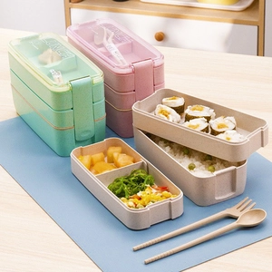 Dual-layer microwave lunch box with cutlery set in wheat straw green, pink, and beige