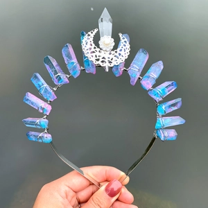 Detail of handmade iridescent crystal crown headband with silver crescent moon and pearl