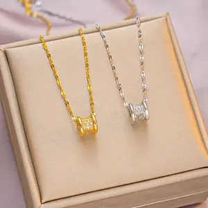 Elegant gold and silver titanium steel necklaces with sparkling crystal cylinder pendants