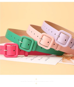 Detail of colorful women thin leather belts with matching square buckles in candy colors