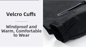 Detail of adjustable Velcro cuffs and waterproof zipper on this black outdoor jacket