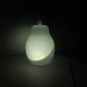Pear-shaped warm white LED night light with translucent frosted finish for DIY decor