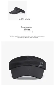 Detail of dark grey sun visor featuring breathable mesh fabric and side typography print