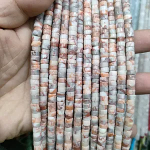 Detailed view of multi-strand natural stone beads in cylindrical shape for DIY jewelry