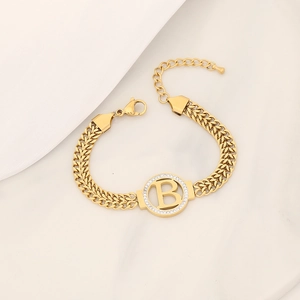 Gold stainless steel bracelet with iced-out letter B pendant and a double-row chain