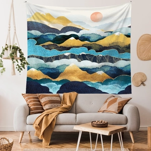 Modern abstract mountain tapestry wall hanging with blue and gold textures for home decor