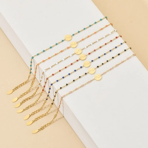 Bohemian seven-piece gold stainless steel bracelet set with colorful beads and Tai Chi charm