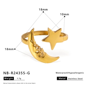 Detail view of gold star and moon ring with waterproof stainless steel specs and dimensions