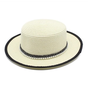 French vintage white boater straw hat with black trim and elegant pearl band detail