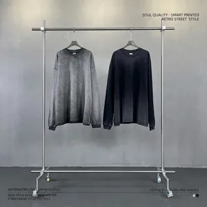 Vintage oversized long sleeve T-shirt with heavy wash effect and distressed edges