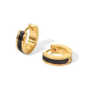 Detail of 18K gold stainless steel hoop earrings with black enamel inlay and hinge