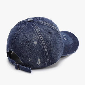 Distressed navy blue denim baseball cap with vintage wash and adjustable metal buckle