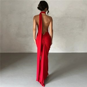 Detail of red backless evening dress with halter neck and metal ring attachment