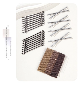 Detailed view of glitter bobby pins set featuring gradient colors and metallic finishes