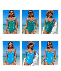 Detail view of one-piece swimsuit in teal and bright blue with contrast trim and slim fit