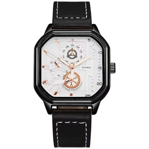 Detailed close-up of a square men's watch featuring a white dial and black leather strap