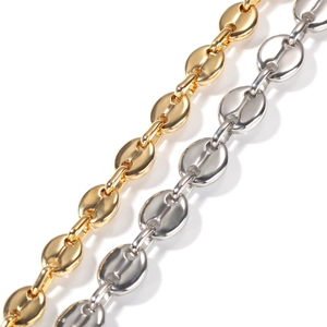 Detail of coffee bean link chain showing polished gold and silver metal finishes