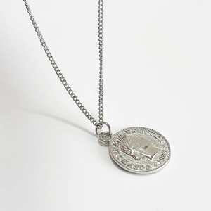 Polished 925 sterling silver coin necklace featuring an 1988 Swiss cross relief pendant