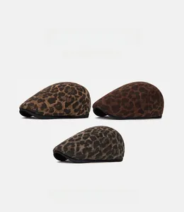 Three leopard print flat caps in brown and grey wool fabric, stylish vintage headwear