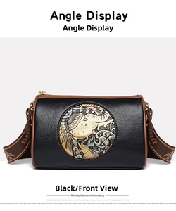 Detail of vintage embossed pattern featuring an elephant on a black Boston shoulder bag