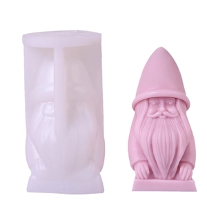 DIY silicone mold for Santa gnome candles and ornaments, showing mold and pink finish