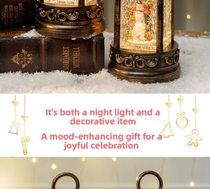 Close-up of vintage bronze Christmas lantern with a snowman and flying snow inside