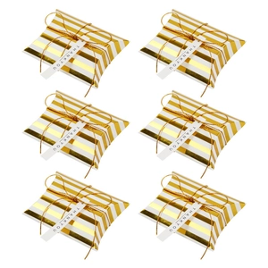 Elegant gold and white striped pillow boxes with gold string and Thank You tags