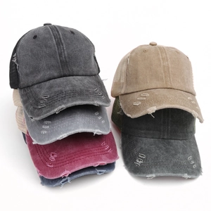 Distressed washed cotton ponytail baseball caps in multiple colors with breathable mesh back