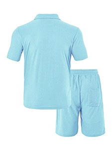 Detail of light blue waffle texture on men's polo and shorts casual summer set