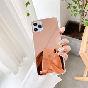 Detailed view of rose gold acrylic mirror phone case with reinforced shockproof corners